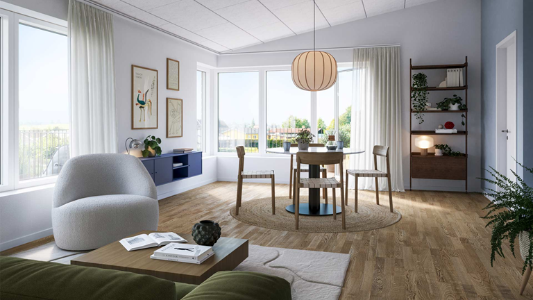 Stue med hvid lænestol og spisebord med stole